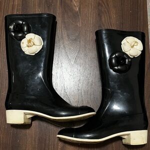 CHANEL Black Rain Boots with Cream Camellia Accents
